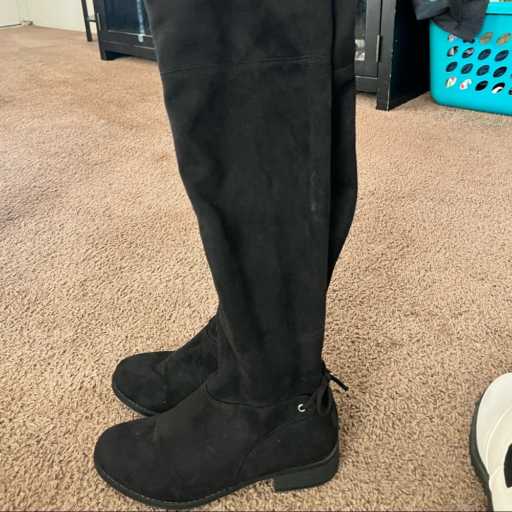 Suede black knee high boots. Low heel.